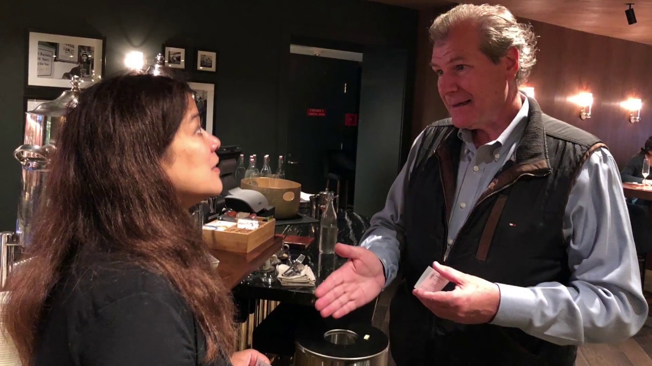 two people talking at a coffee meetup