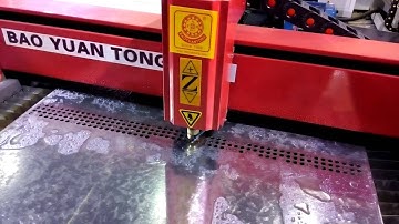 plasma cutting machine cutting small metal holes for LED light