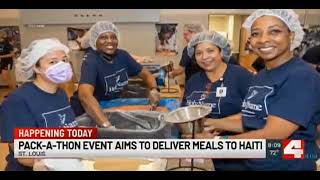 Volunteers in St. Louis Pack Meals for Haiti
