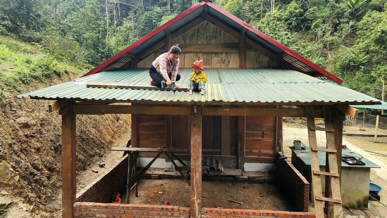 The arduous journey of An & Bảo: Roofing a corrugated metal roof for his new kitchen.