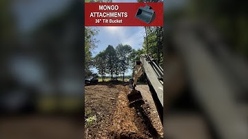 Mongo Tilt Bucket Digging a Utility Trench