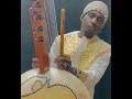 Capture de la vidéo Jali Burama Mbye Playing The 22 Stringed Kora For Sale