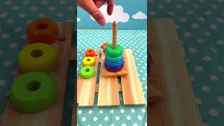 Wooden Ring Dowel Unstacking! 🧩 Unloading Colorful Wood Hoops Next to a Monkey Toy