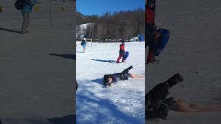 Girl Snowboarder Takes Faceplant, Laughs