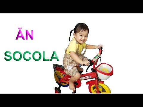 Video Bé Chạy Xe Ăn Kẹo Socola Đồng Tiền Vàng ❤ - youtube
