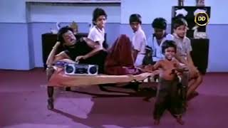 Breakdancing midget scene from Adhasaya parivi