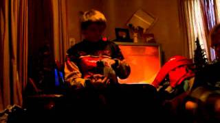 Corbin opening his Chirstmas gift (2 of 2)