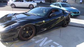 A black 2019 ferrari 812 superfast with custom wheels and exhaust
arriving at leaving cars chronos hing wa lee plaza. (november 23, /
walnut,...