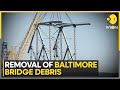 Floating crane removes largest piece of collapsed baltimore bridge  latest english news  wion