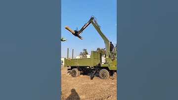 Four-wheeled grab Rotating wood grab Self-loading and dumping transport vehicle One machine with