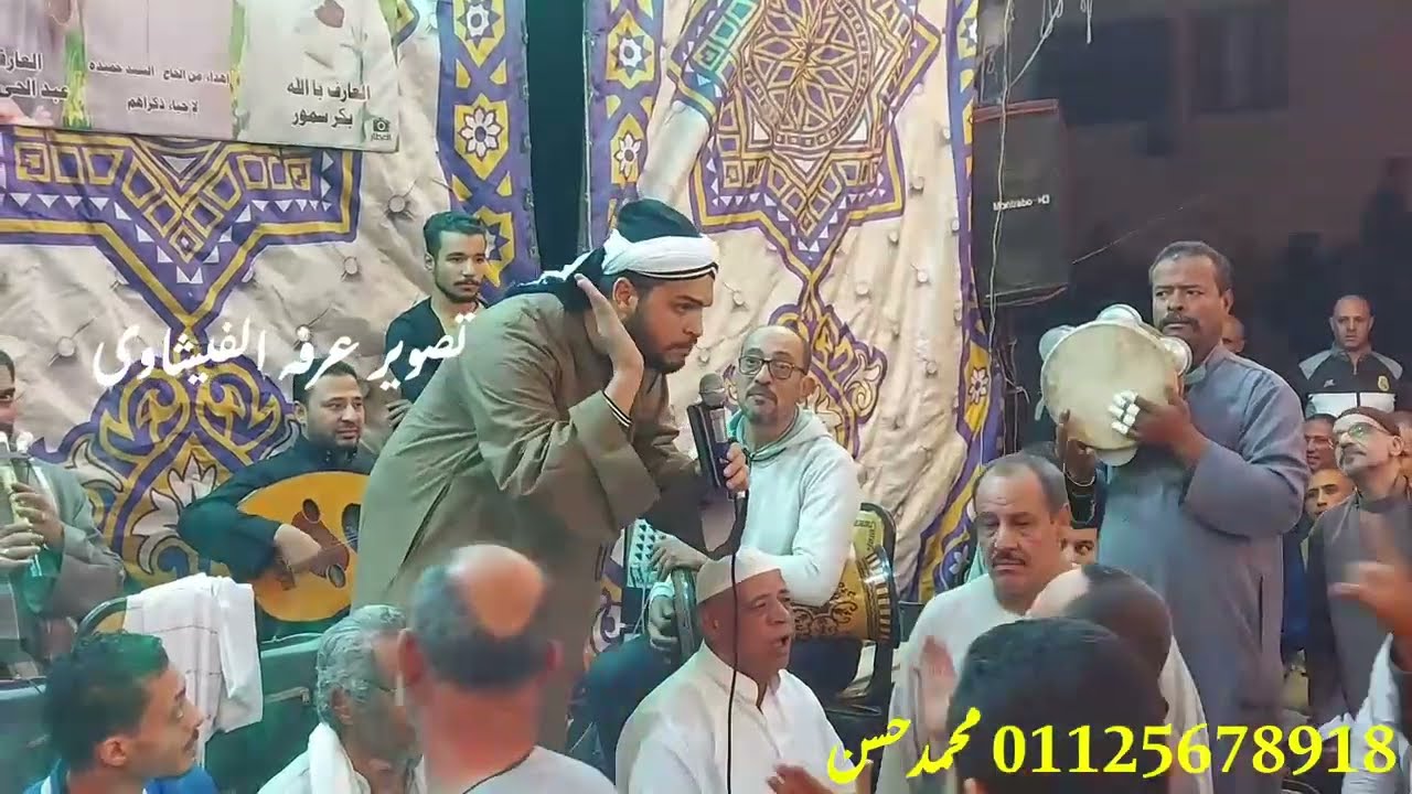 الشيخ محمد حسن فى الطبقه الثانيه من ليلة بلقينا (( الشيخ بكر سمور ))