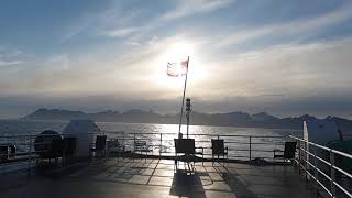 Ferry From Moskenes To Bod Midnight Sun With Lofoten As Backdrop
