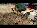 Komatsu D31A Bulldozer operator need to be careful filling land on time to connect to the house