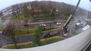 Tower crane installs new cell in ...