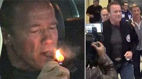 Arnold Schwarzenegger Lights Up After Landing At L...