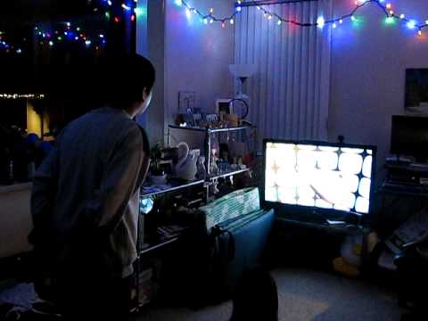 Timothy playing Table Tilt on the Wii Fit