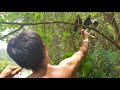 Primitive technology with survival skills hunting birds dove cooking for food