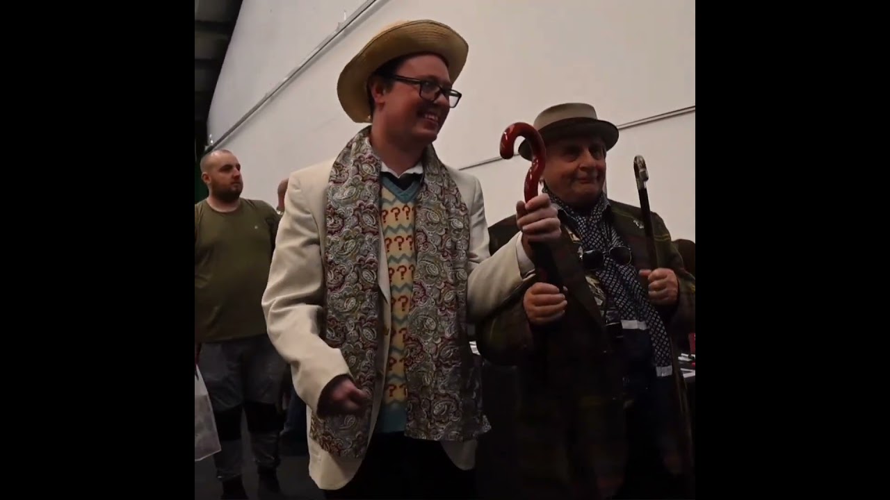 Sylvester McCoy meeting fan Adam at Wigan Comic Con 2023