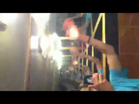 Kendall Schmidt and Carlos Pena goofing around with bathroom mirrors