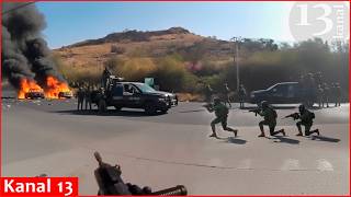 Download Lagu Footage of fierce street battles between Mexican security forces and cartel gunmen MP3