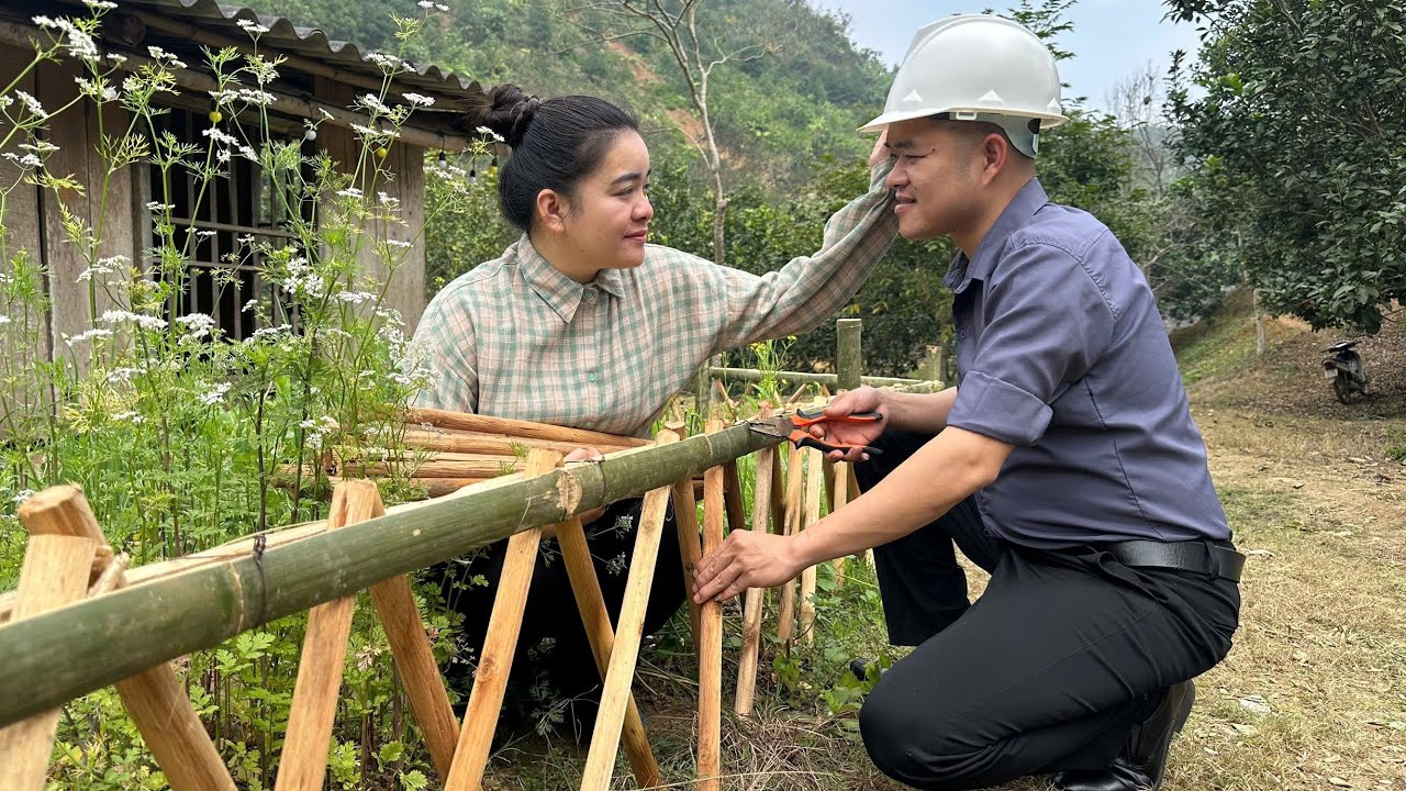 Генеральный директор Тунг и Ту Ань были счастливы вместе огородить сад забором.