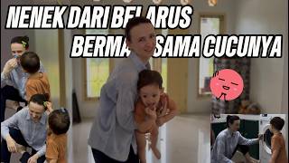 A Belarusian Grandmother Plays With Her Grandchildren