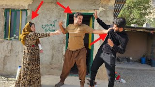 The presence of Ali's friend next to Kobra and Asghar's unexpected tension with him.