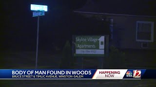 Man's body found in woods near Triad apartment complex