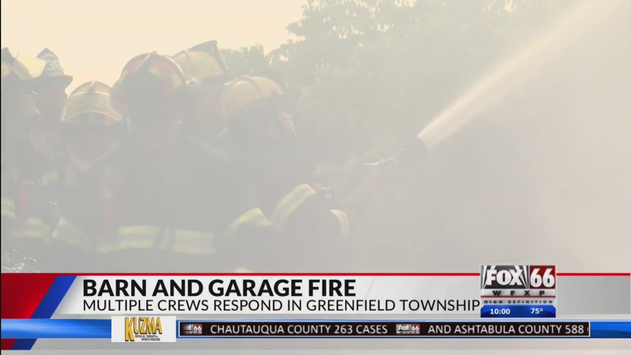 Multiple crews respond to a barn and garage fire in Greenfield Township