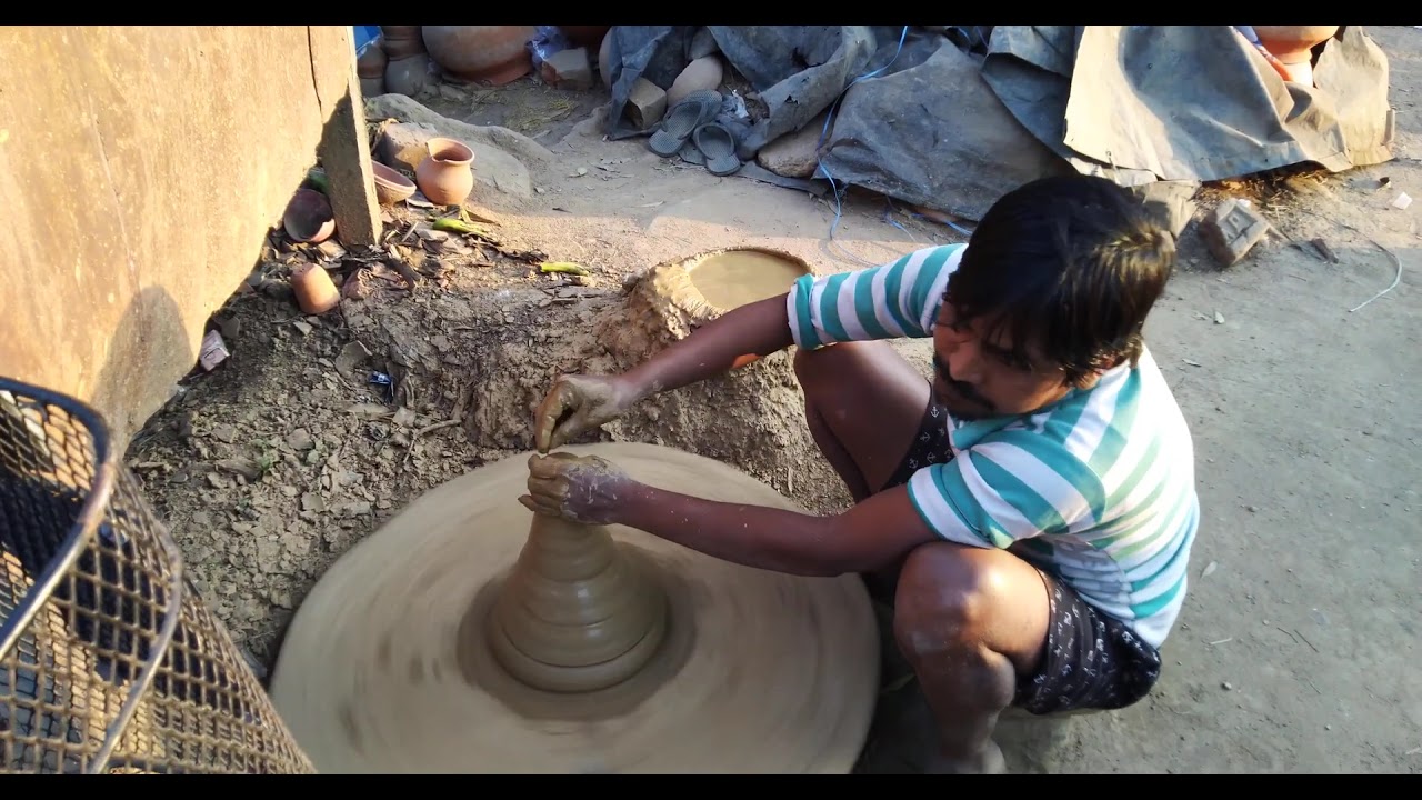কুমোরের মাটির চা এর কাপ তৈরী (making tea cup using clay by potter