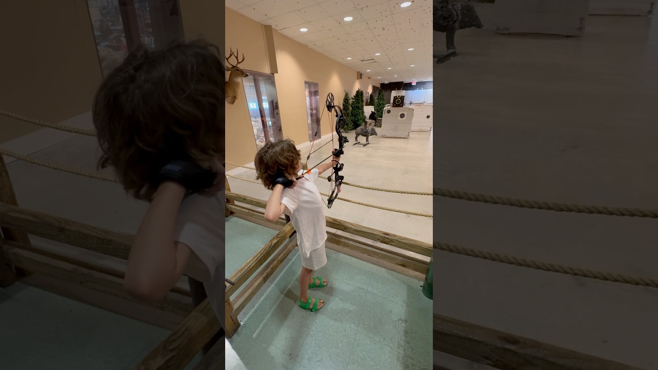 Pull! Jr with his new blackout faze 2 compound bow 