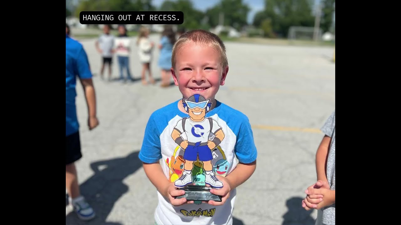 Video preview image of A boy smiling holding a statue of the carroll high school mascot; click to visit the ParentSquare post with the video