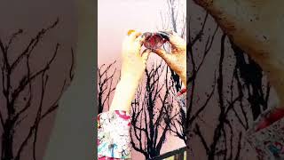 Creative Tree Painting on Outdoor Canvas Scene