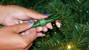 How to troubleshoot a pre-lit Christmas tree when the top section is not lighting up.