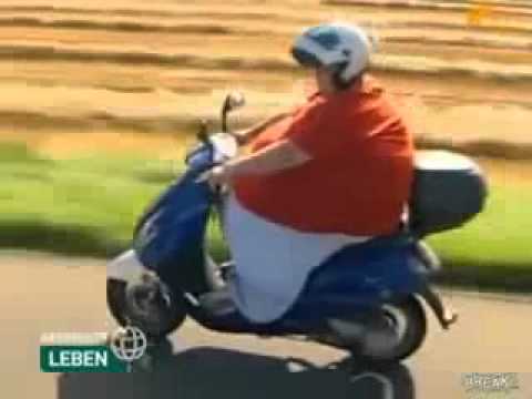 Fat Guy On A Moped 112