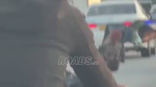 A biker was seen watching videos on a mobile phone mounted on the motorcycle while riding