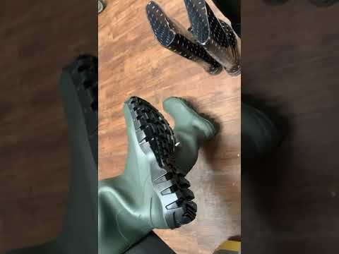 Trying on different styles of wellington boots