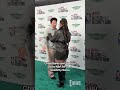 Chloe Bailey and Simu Liu hug on the NBA All-Star Celebrity Game red carpet.