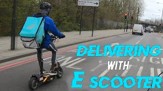 He is Delivering with E Scooter Working for UberEats/Deliveroo London