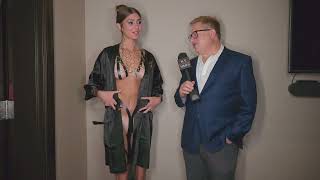 Model Naomi backstage revealing her Blacktape Project runway look at Art Hearts Fashion Miami Swim