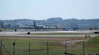 US Air Express SAAB SF340 windy day landing at DCA runway 33 on 10/7/09 at 1343