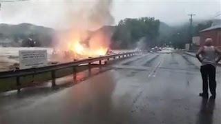 West Virginia Floods: Burning Building Swept Away