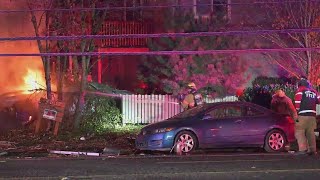 Man arrested after fiery car crash into power pole in SE Portland