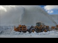 Larue D97 single-stage snow blower at snow dump site