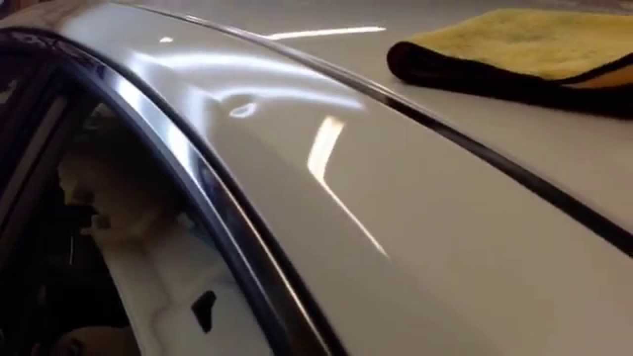 Hail Repair Dent Bros Large Hail Dent repaired by the glue pulling