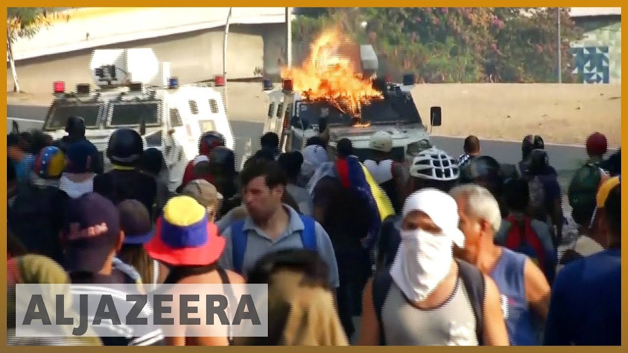 🇻🇪 الفنزويليون يتظاهرون في احتجاجات متنافسة مع تفاقم الأزمة | الجزيرة الإنجليزية