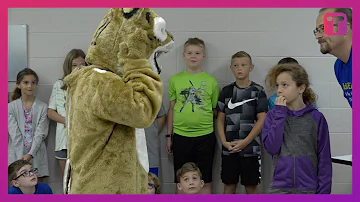 Soldier Surprises Daughter At School In Mascot Costume