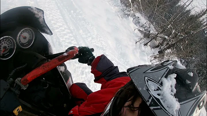 me and my 8 year old snowmobiling together