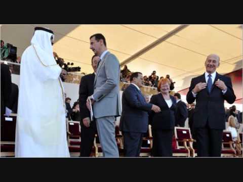 President Hafez al-Asad meets US President George Bush on November 23 ...