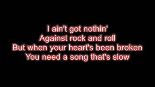 Video thumbnail of "Alan Jackson - Don't rock the jukebox LYRICS"